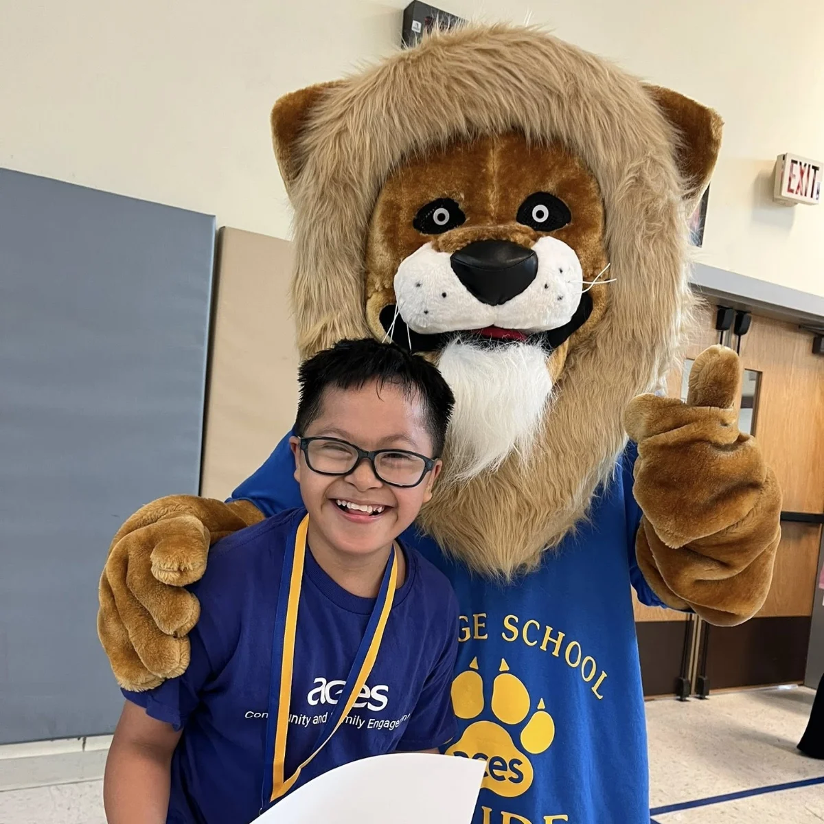 Village School student and Mascott