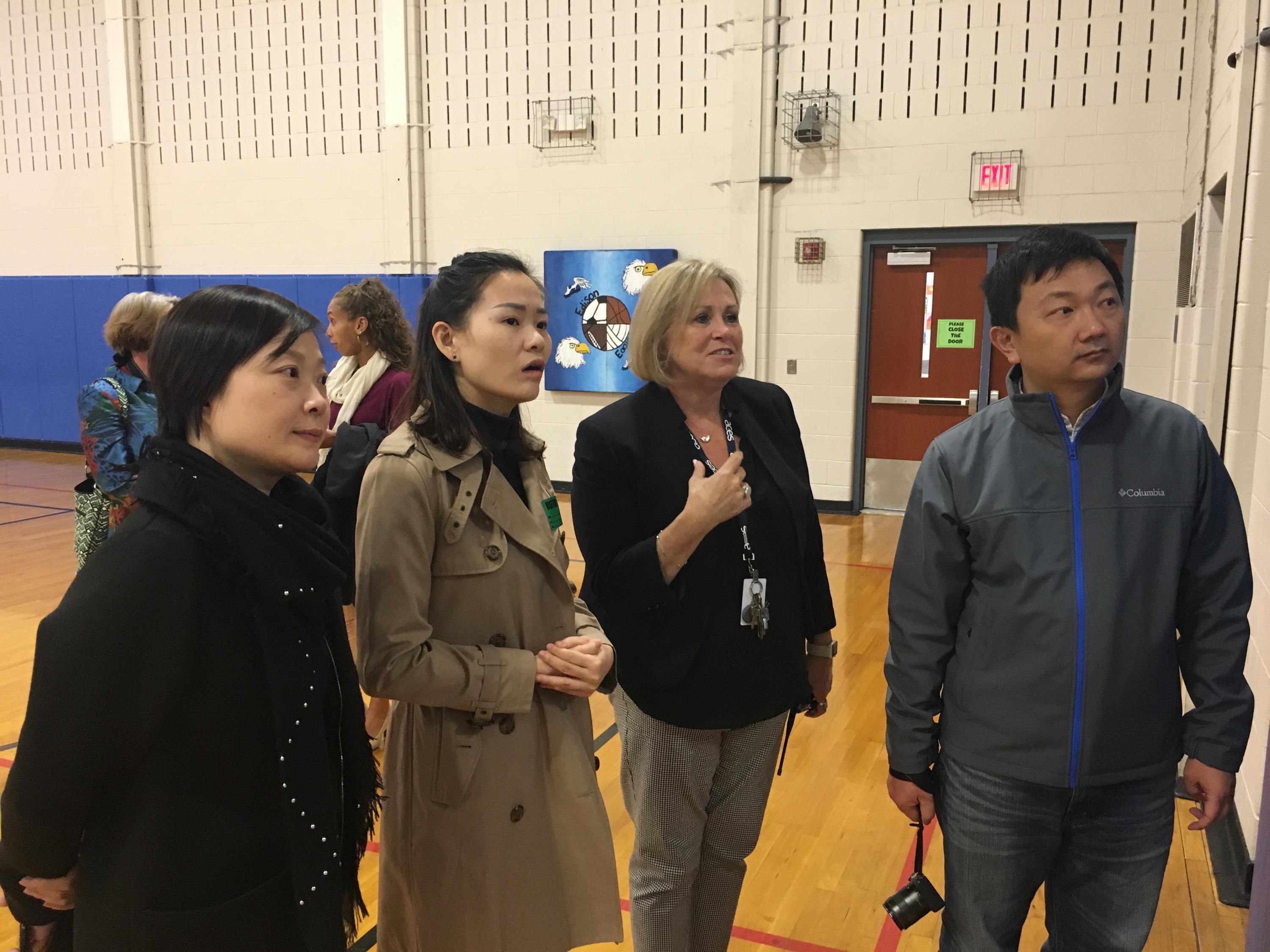 A small group of educators from ACES ECA and a school in China engage in a conversation.