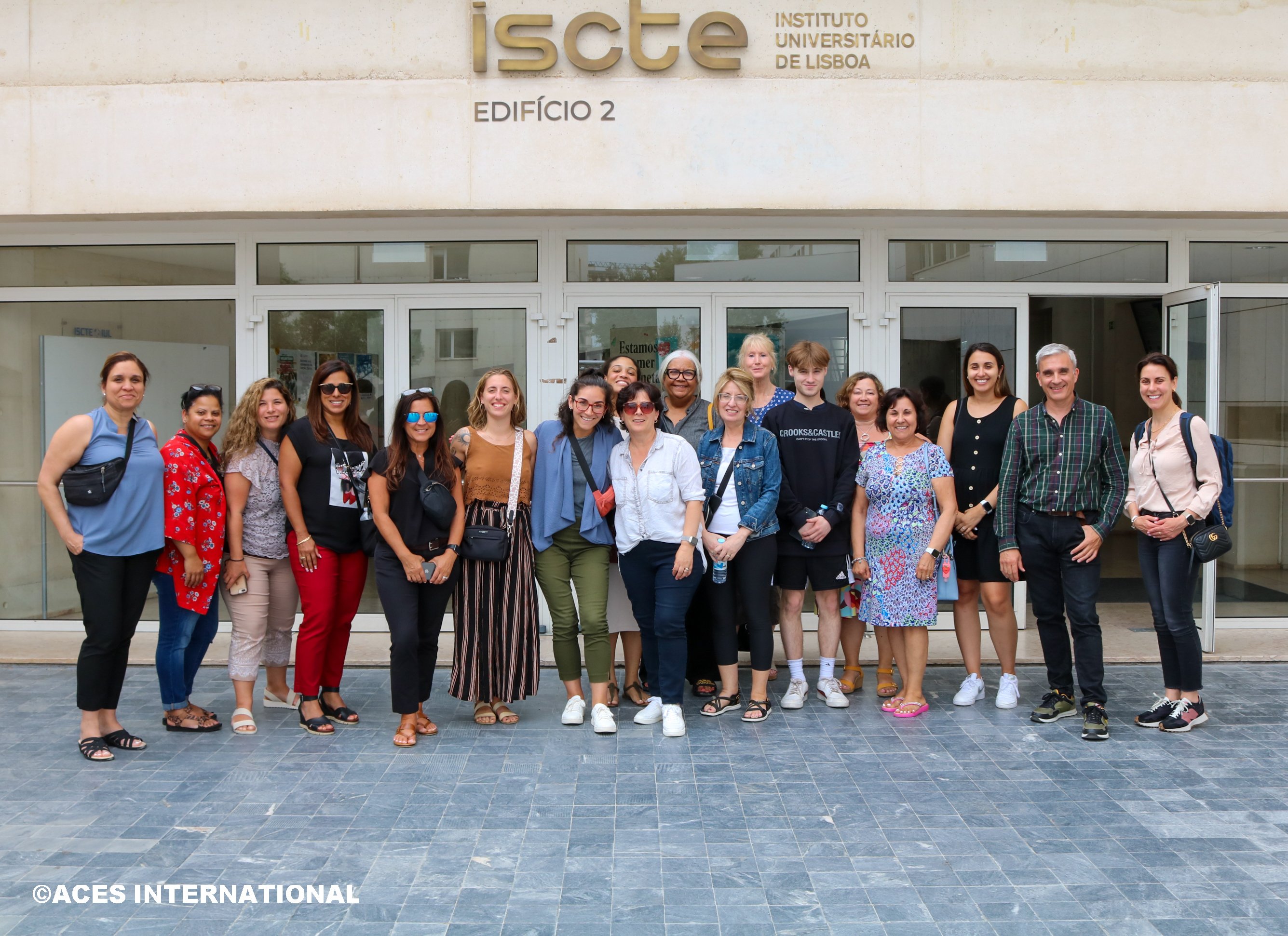 The Educators Field Study group takes a picture in front of the Instituto Universitário de Lisboa.